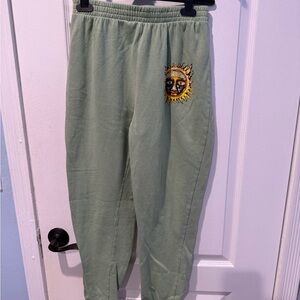 Green Sweatpants with Sun Design